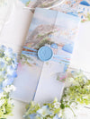 Reisepass-Einladung Set mit Vellum-Aquarell und Monogramm-Wachssiegel | Santorini, Griechenland