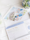Reisepass-Einladung Set mit Vellum-Aquarell und Monogramm-Wachssiegel | Santorini, Griechenland